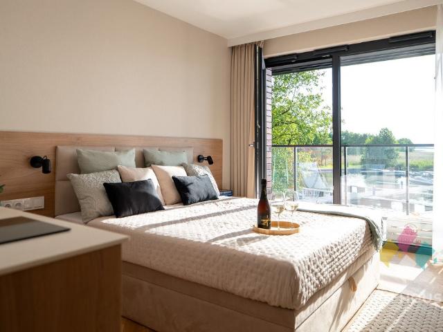 Apartament nad jeziorem w Port 69 – 48 m2, plaża, marina