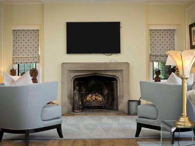 OFFERED FURNISHED. Beautifully presented wing of a historic Tarrant mansion, tastefully renovated to a high standard in the prestigious St George's Hill estate. ALSO AVAILABLE FOR SHORT LET