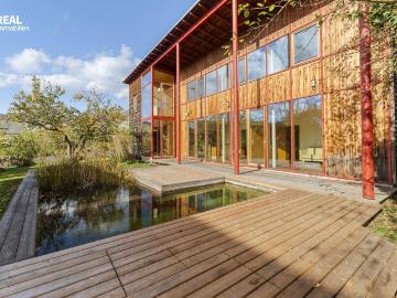 Neuer Preis: Ökologisches Architektenhaus mit Naturbadeteich in Bestlage von Gleisdorf