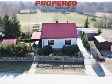 Dom z panelami fotowoltaicznymi i dużą działką 4923 m²