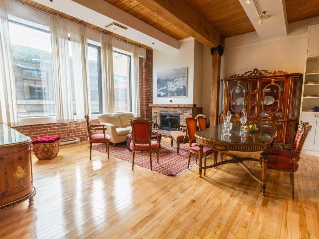 Old Montreal Condo Rental at Maison Saint Paul Gorgeous 1 Bedroom, 2 Bath with Exposed Brick Walls and Beautiful Fireplace