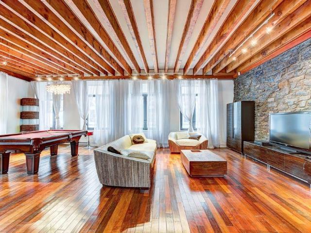 Old Montreal Furnished Luxury Penthouse For Rent on Rue du Saint Sacrement – Incredible 2 Bedroom, 1.5 Bath with Exposed Brick Walls, Stunning Open Ceiling Beams and Gorgeous Decor
