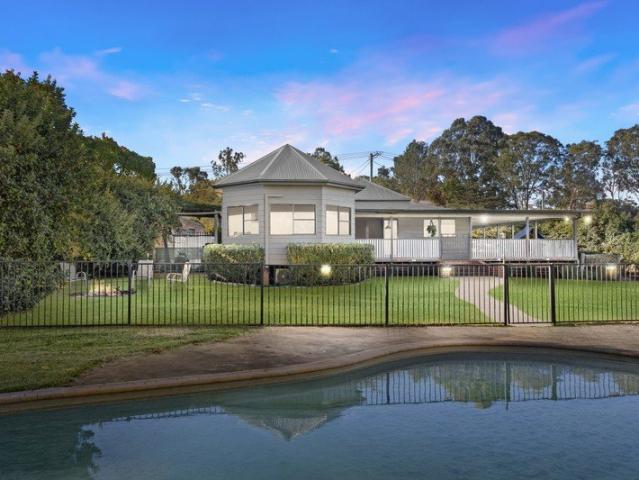 Old world charm, stunning views and with resort style outdoor spaces
