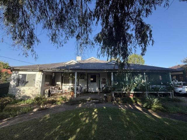 Older charming home with features of its era