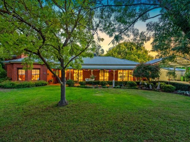 On Course Acreage Living with Direct Buggy Access to the Fairway & River