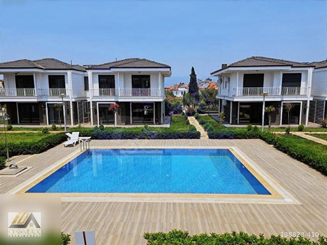 ONMAX PELİTKÖY SAHİL'DE SATILIK SIFIR 3+1 SİTE İÇİ HAVUZLU VİLLA