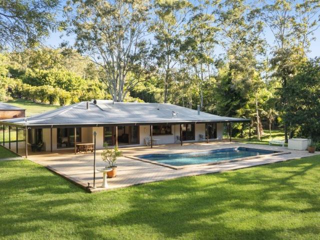 Once in a generation Acreage Living with Rare River Frontage