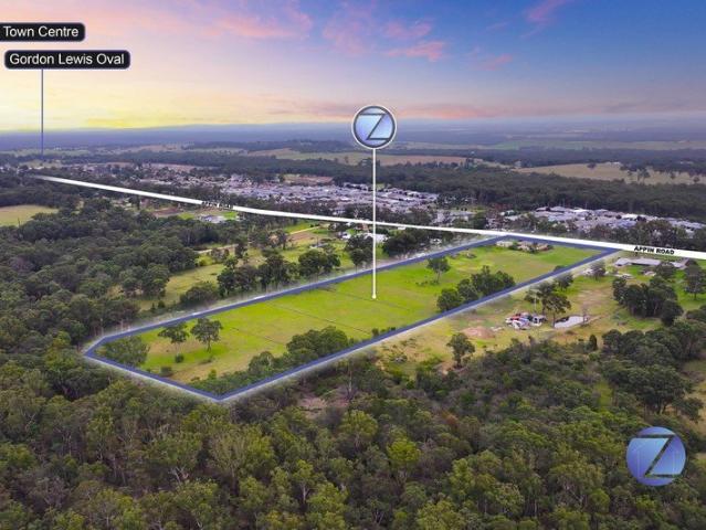 ONCE IN A LIFETIME DEVELOPMENT OPPORTUNITY ON 14 ACRES IN TOWN !