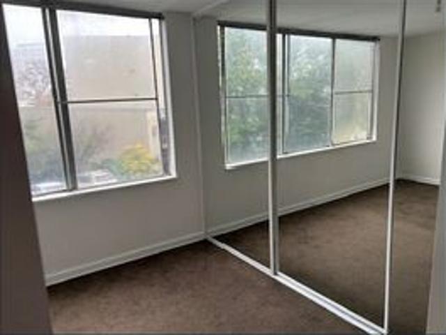 One bedroom unfurnished unit in gated complex, excellent location