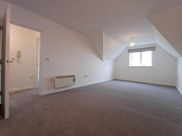 One bedroom, part furnished top floor flat to rent