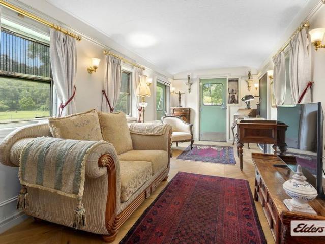 One of a Kind Converted Train Carriage Home