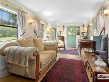 One of a Kind Converted Train Carriage Home