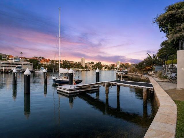 One of a kind stunning waterfront home with a studio