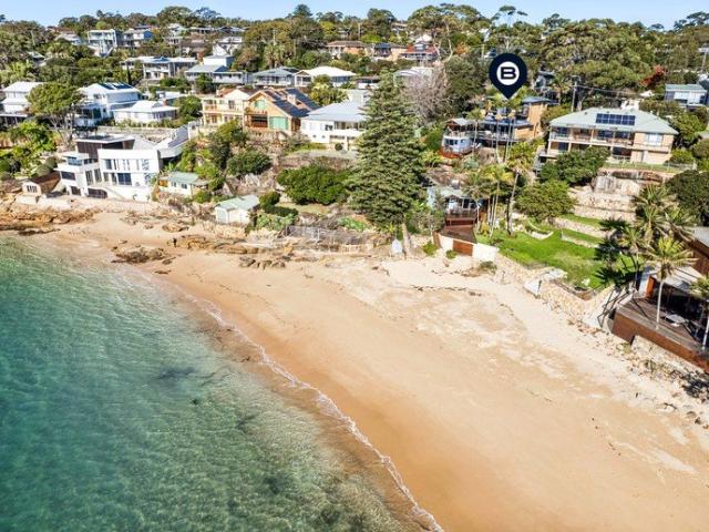 One of Only Three Absolute Beachfront Residences on Little Gunyah Beach with Two Guest Cabins and Sweeping North Facing Ocean Views