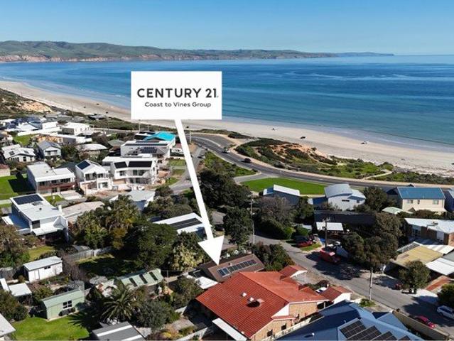 ONE STREET FROM THE BEACH. ENDLESS COASTAL POTENTIAL!