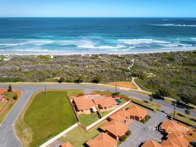 One Title. Two Incomes. An Incredible Beachside Position!
