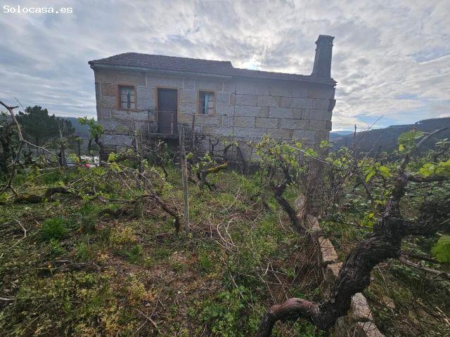 ¡OPORTUNIDAD ÚNICA EN TOÉN! CASA CON GRAN TERRENO Y VISTAS ESPECTACULARES