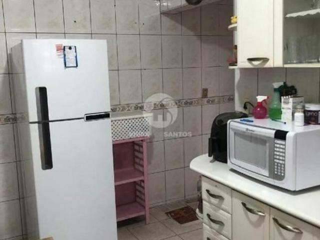 Oportunidade Imperdível em Santos! 2 Casas em um Só Terreno!