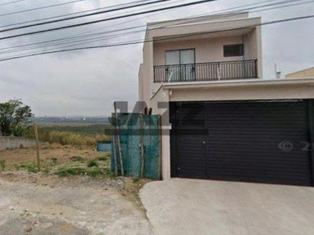 Oportunidade Única com Vista Eterna para o Pôr do Sol: Terreno de 5x25m com 80m² de Recuo e Projeto