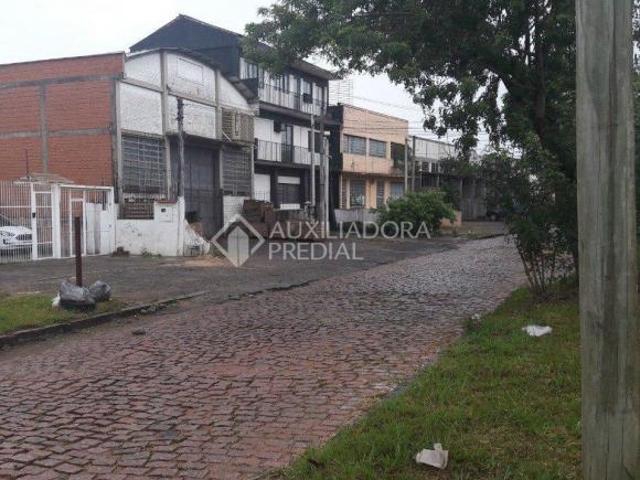 Oportunidade Única: Terreno com 3 Residências no Bairro Anchieta