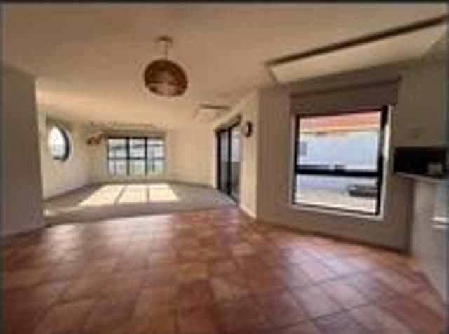 Open Plan Family Home with Secure Backyard & Great Location