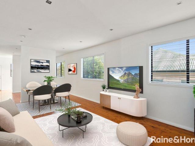 OPEN PLAN LIVING WITH THREE BEDROOMS!