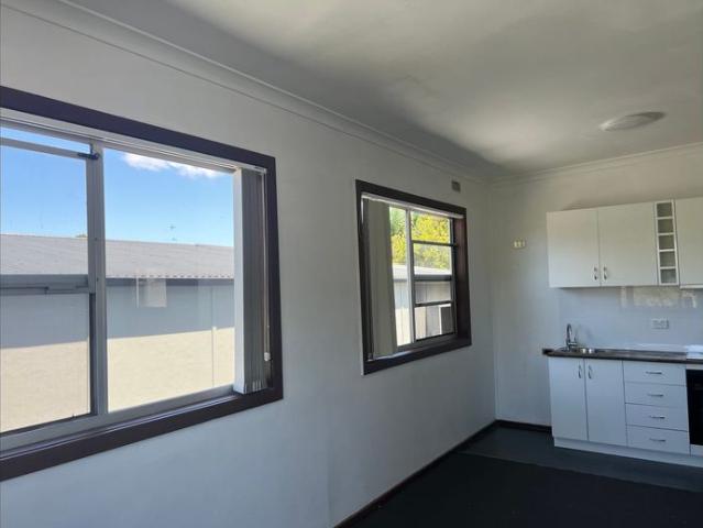 Open plan studio with private ensuite, kitchen mirrored built in robes