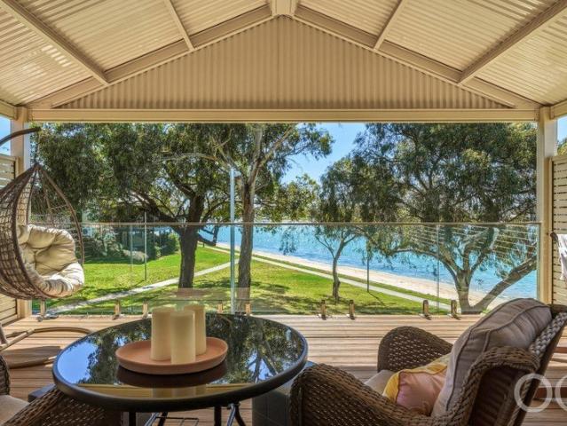 Open the Door to Modern Lakeside Living With a Spacious Private Balcony
