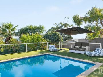 Open the Door to Ocean Views & Coastal Entertaining / Close the Door On Compromise