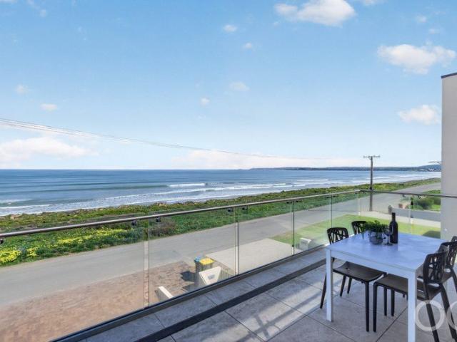 Open the Door to Oceanfront Living and Watch the Waves Roll In