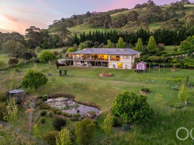 Open the Door to a Country Homestead Plus Three Retreats on 47 Acres