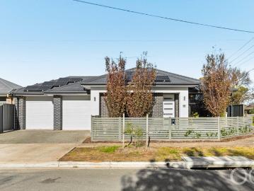 Open the Door to a Cornered, Solar Powered Home with Parks and City in Reach