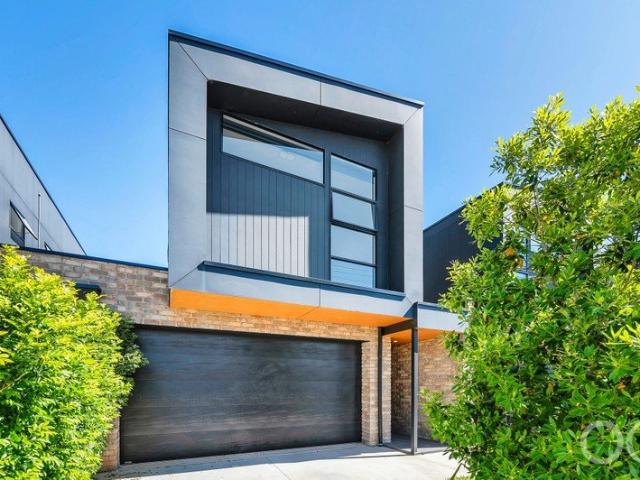 Open The Door To a Bold Architectural Home with a Beachy Way of Life