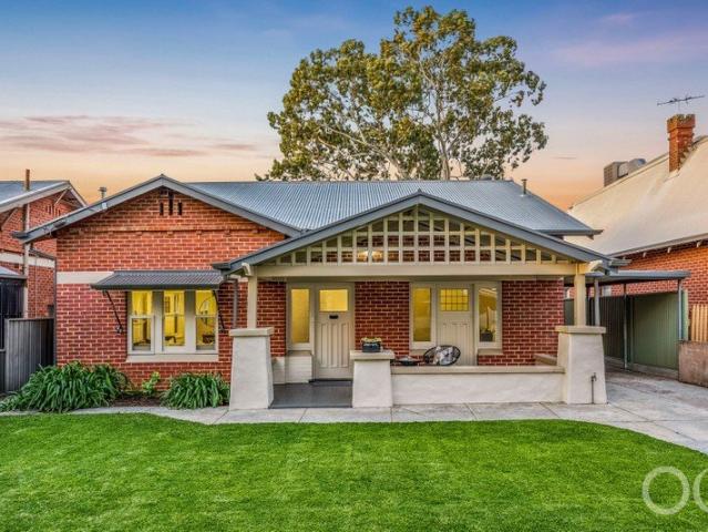 Open the Door to a Bungalow with Big Backyard Ambitions