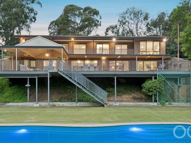 Open The Door To a Generational Hillside Hideaway with Breathtaking Gulf Views