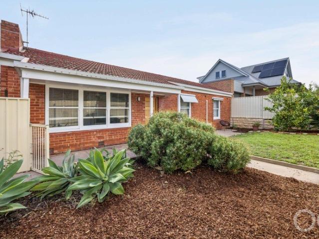 Open the Door to a Double Brick Original With a Fresh Outlook on Easy Living