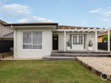 Open the Door to a Double Brick Beauty Perfected for the Modern Family