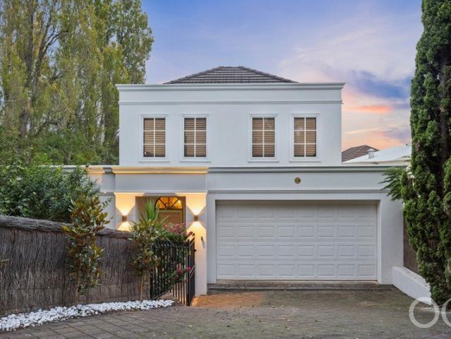 Open the Door to a Feel Good Home, Peacefully Positioned Yet Close to Everything