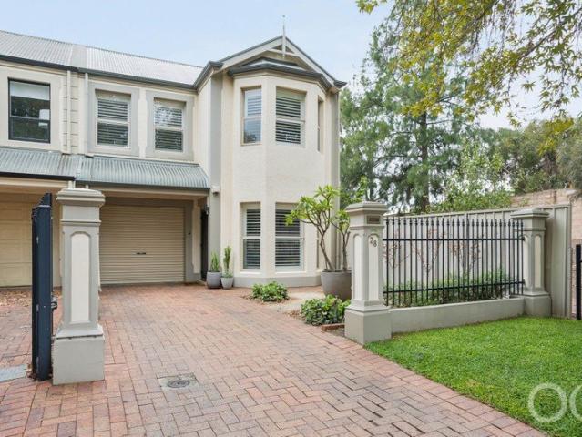 Open the Door to a Home That's a Walk in the Park