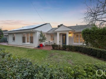 Open the Door to a Solid Brick Home With Attached Self Contained Unit