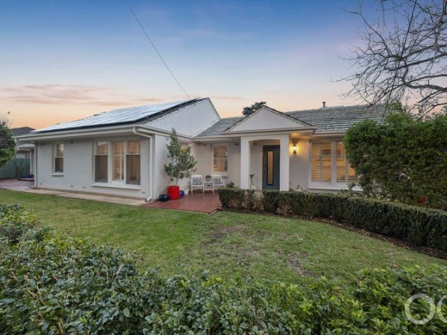 Open the Door to a Solid Brick Home With Attached Self Contained Unit