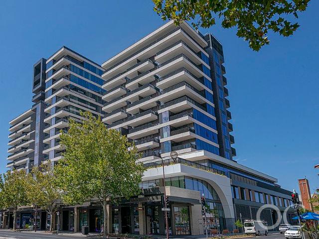 Open the door to a stunning sub penthouse residence offering elevated, light filled living