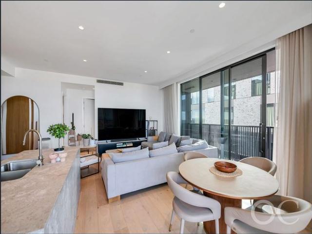 Open the door to a stunning sub penthouse residence offering elevated, light filled living