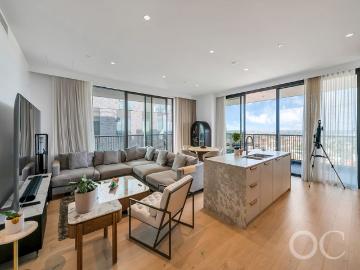 Open the door to a stunning sub penthouse residence offering elevated, light filled living