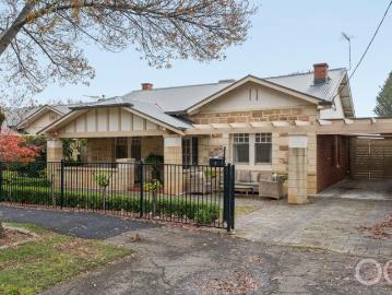 Open the Door to a Position Perfect Bungalow with a Crowd Pleasing Finale