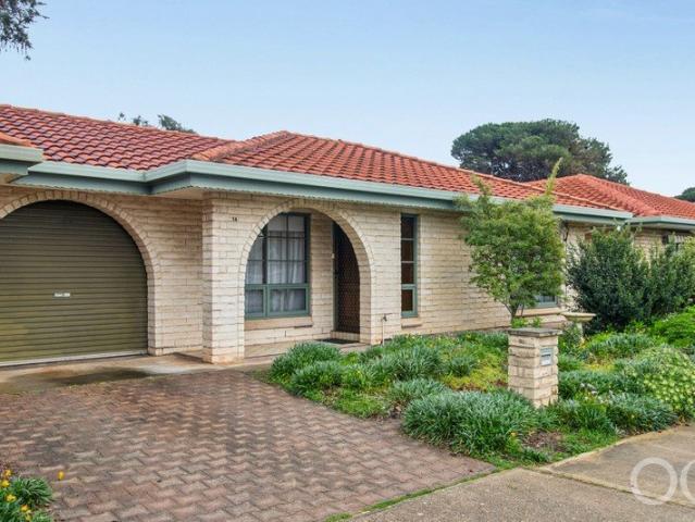 Open the Door to a Rarely Available 3 Bedroom Unit With Private Yard