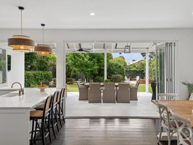 Open the Door to a Reimagined Bungalow with a Social Finale and Rear Lane Access