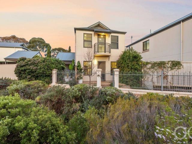 Open the Door to a Tucked Away Townhouse Where Mile End Meets the Parklands