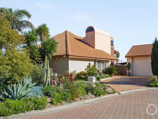 Open the Door to Architecturally Designed Excellence with Exceptional Space & Versatility
