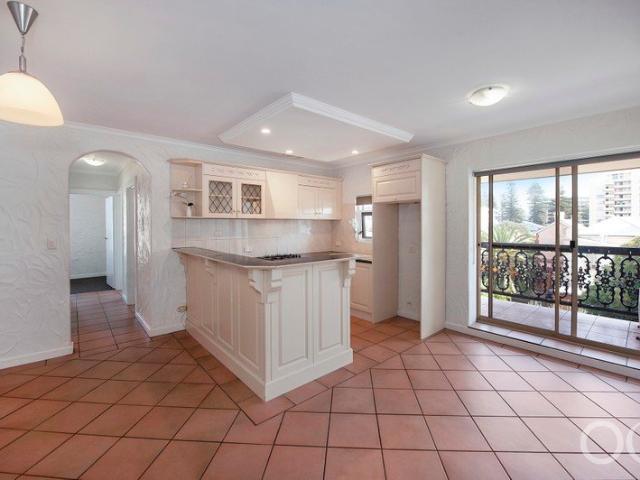 Open the Door to Beachside Living with Sweeping Views